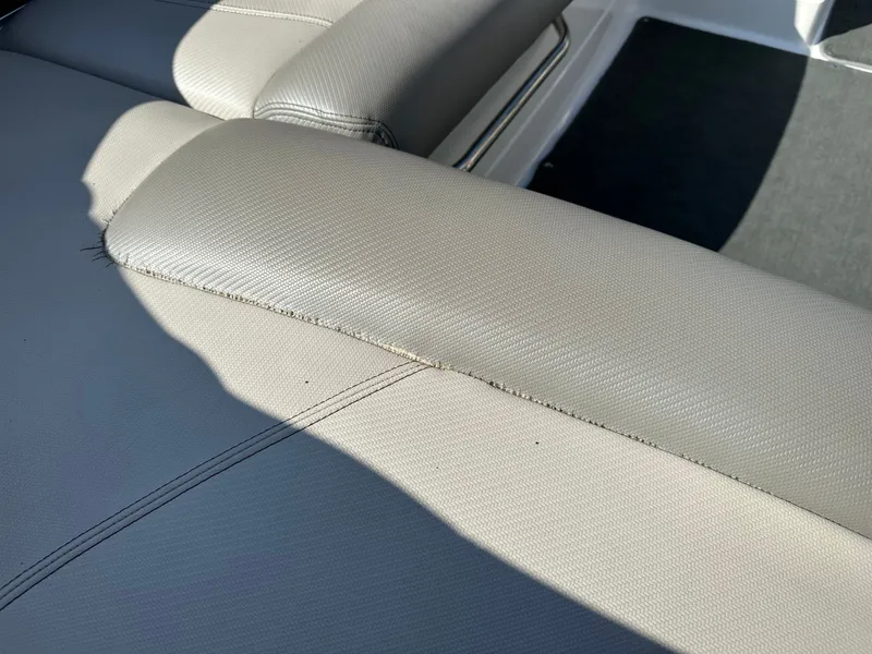 Slide: The Image of Close-up of seat upholstery on a 2011 MasterCraft X2 boat. - 13