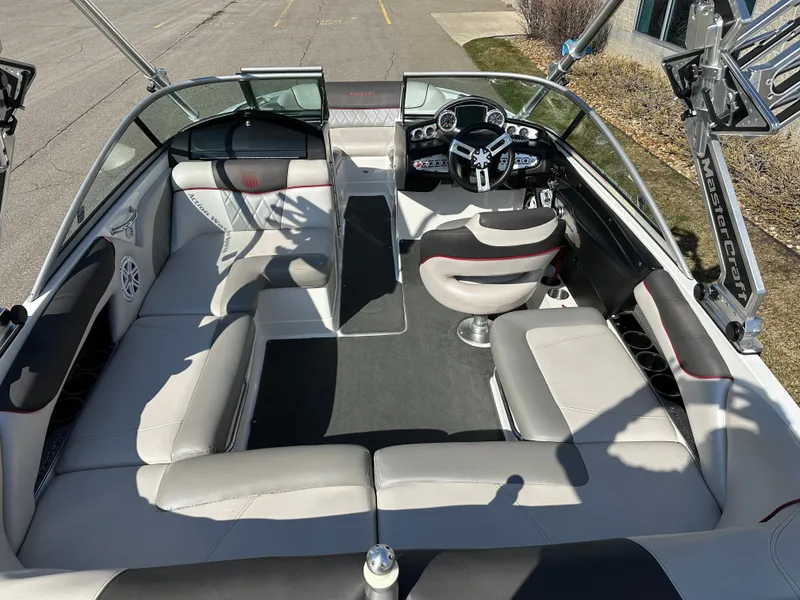Slide: The Image of Interior of a 2011 MasterCraft X2 boat, modern features. - 6