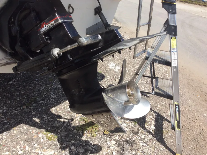 Slide: The Image of 1994 Bayliner 2655 Cierra boat propeller and outdrive close-up. - 11