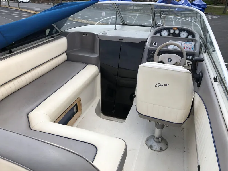 Slide: The Image of 1994 Bayliner 2655 Cierra boat interior with helm, seating, and dashboard. - 13
