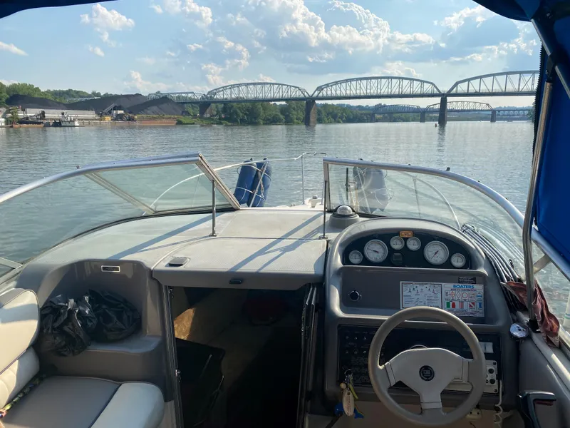 Slide: The Image of 1994 Bayliner 2655 Cierra boat interior with river and bridge view. - 16