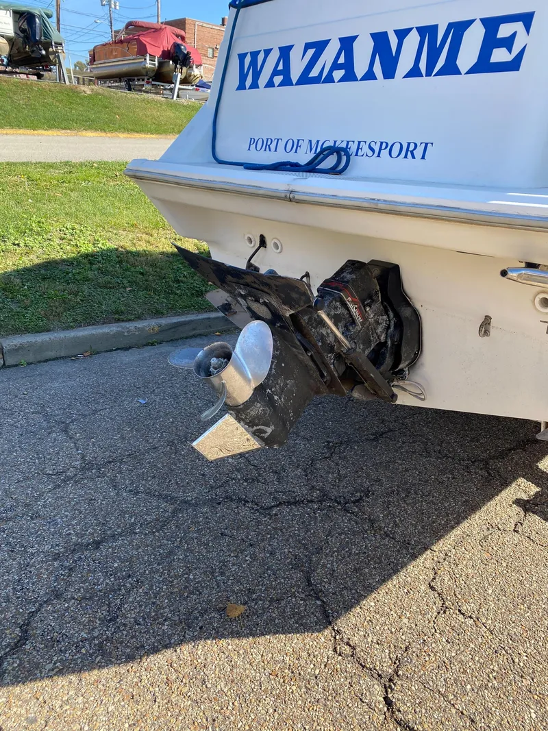 Slide: The Image of 1994 Bayliner 2655 Cierra boat stern with propeller and Wazanme name. - 8