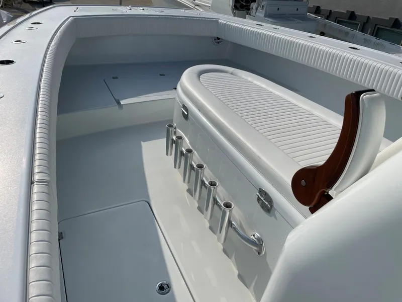 Slide: The Image of 2019 Freeman 37 boat interior with seating and rod holders. - 19