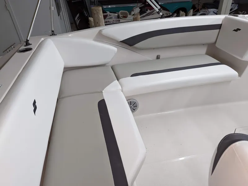 Slide: The Image of 2023 Starcraft SVX 171 OB boat interior with white and gray seating. - 9