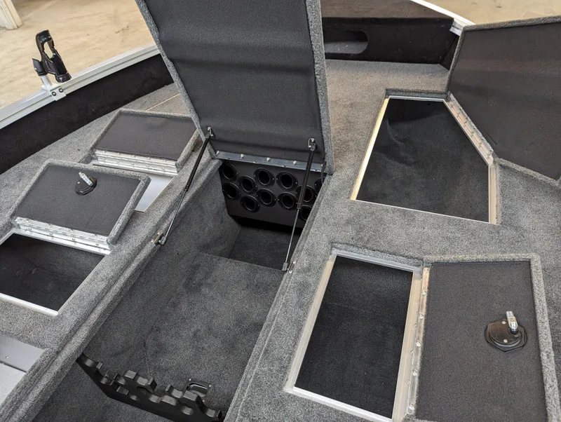 Slide: The Image of 2023 Smoker Craft Adventurer 188 T boat interior storage compartments. - 12