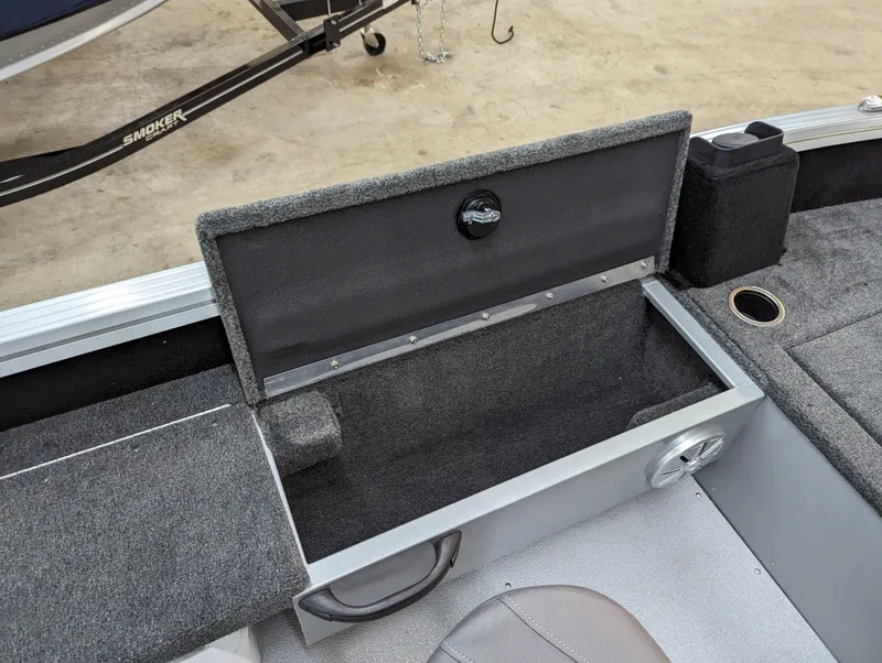 Slide: The Image of 2023 Smoker Craft Adventurer 188 T boat storage compartment. - 14