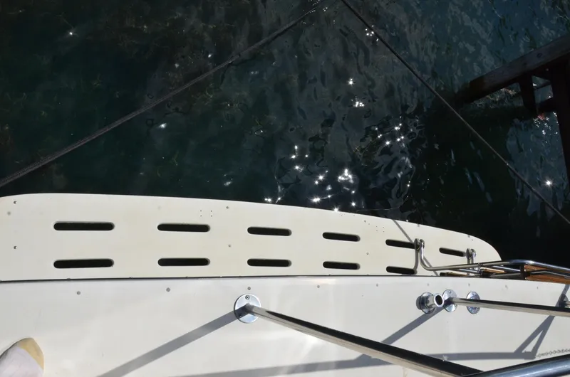 Slide: The Image of 1984 Chris-Craft 381 Catalina boat deck with water reflections. - 6