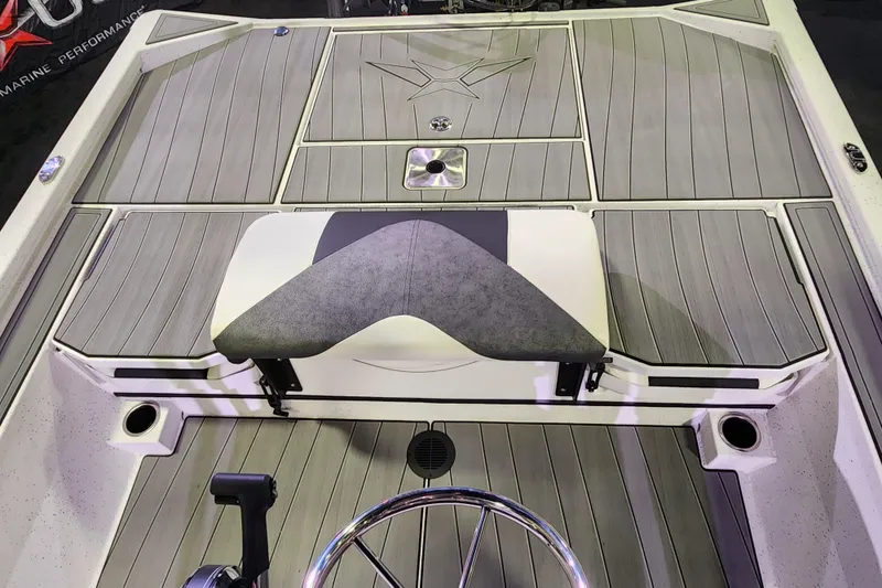 Slide: The Image of 2023 Vexus AVX2180CC boat interior with gray deck and seating. - 9