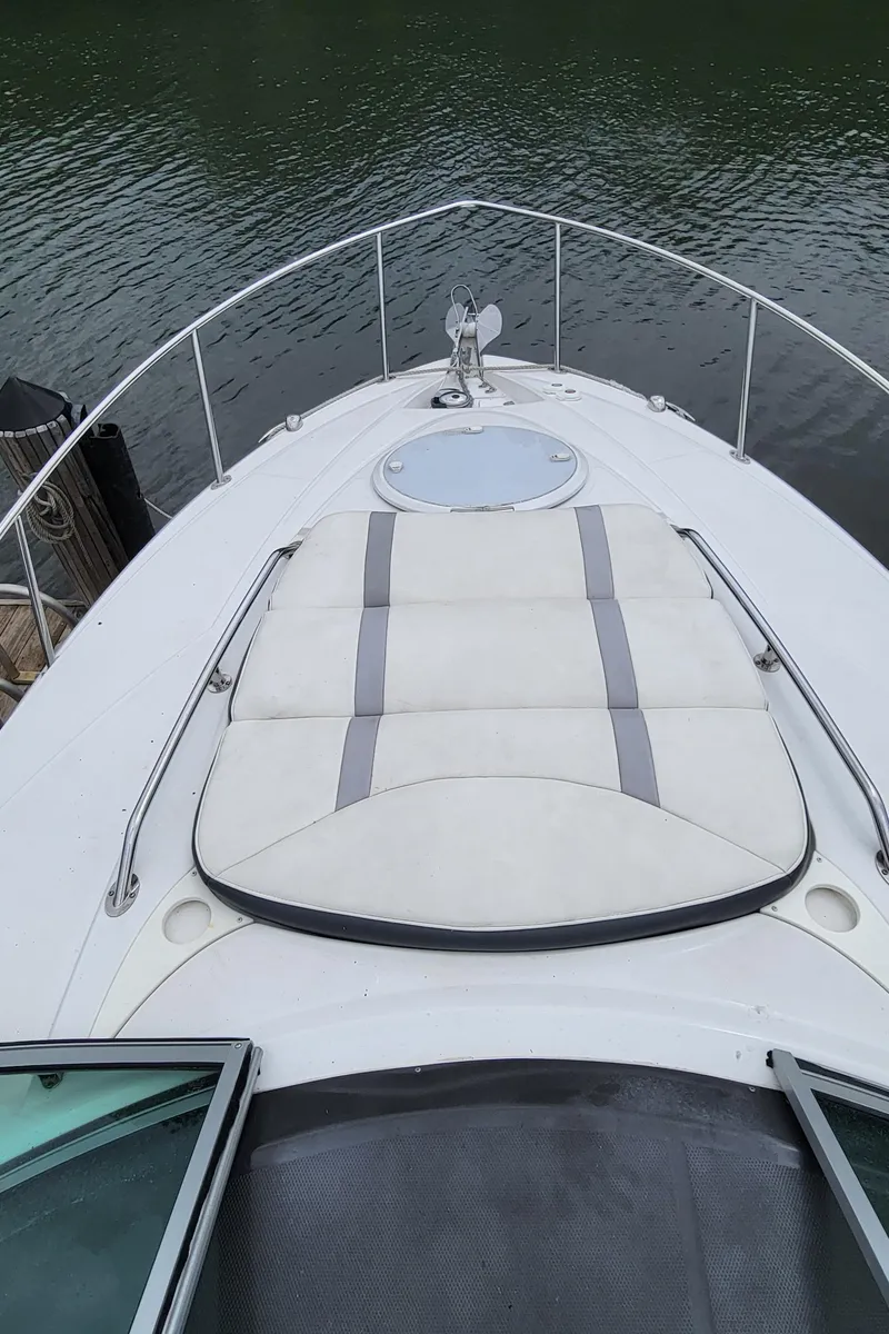 Slide: The Image of 2016 Monterey 275 Sport Yacht bow with sunpad and railing. - 6