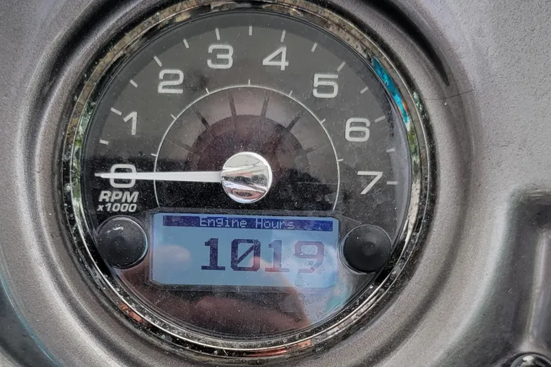 Slide: The Image of Close-up of 2016 Monterey 275 Sport Yacht tachometer showing 1019 engine hours. - 7
