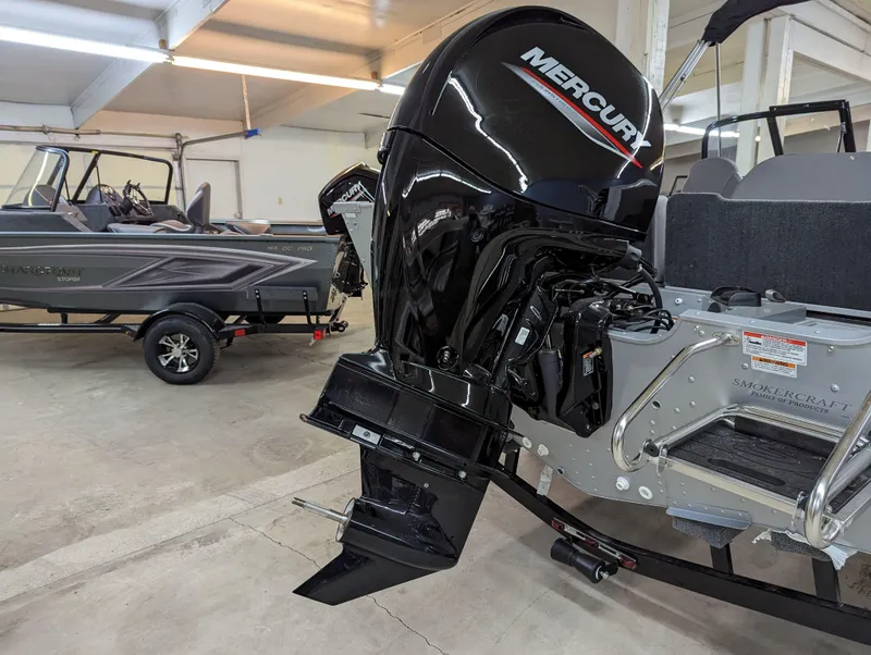 Slide: The Image of 2023 Smoker Craft Pro Angler XL 182 with Mercury outboard motor in showroom. - 10