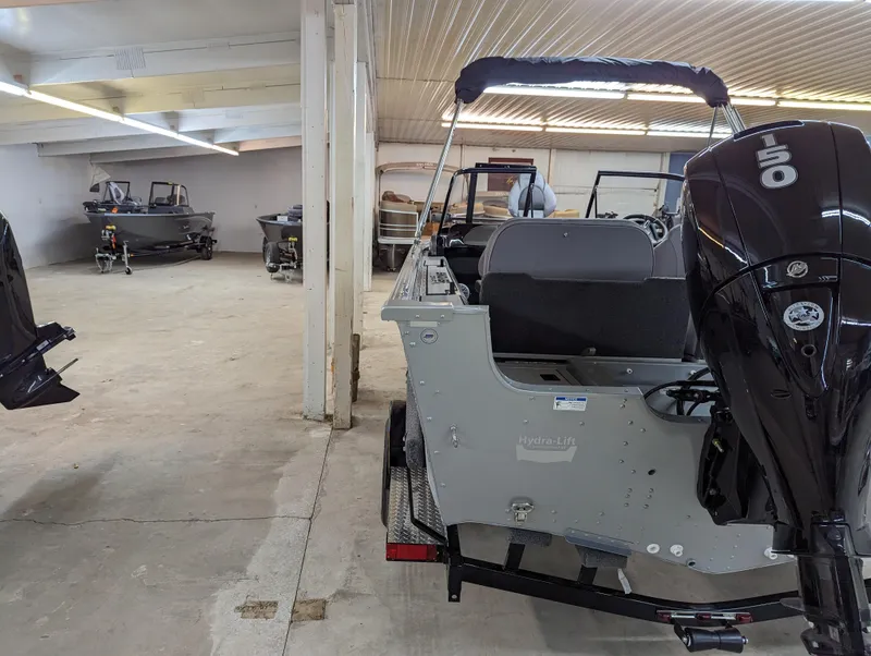 Slide: The Image of 2023 Smoker Craft Pro Angler XL 182 boat in storage facility. - 11