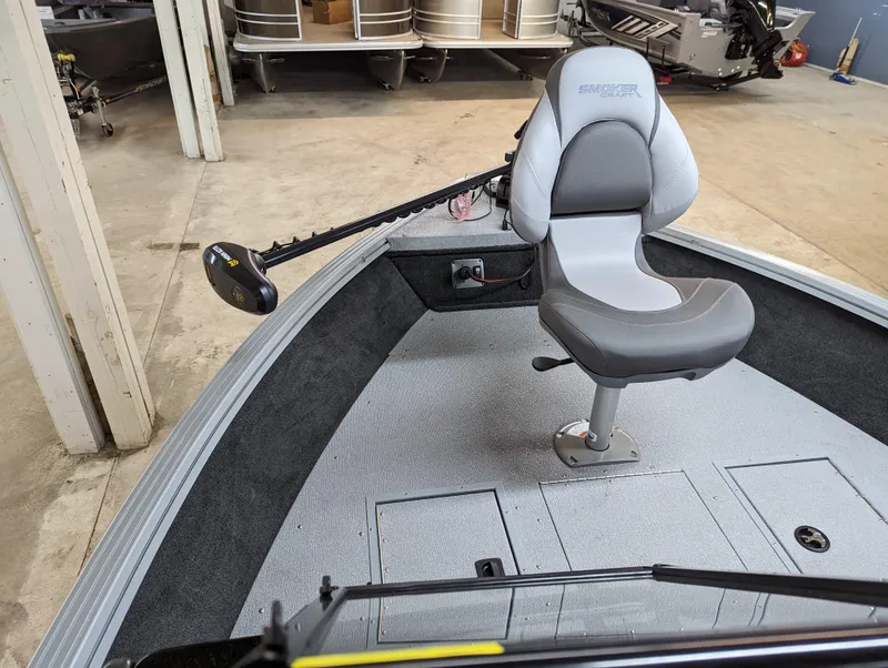 Slide: The Image of 2023 Smoker Craft Pro Angler XL 182 boat interior with fishing seat and trolling motor. - 6