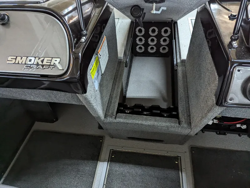 Slide: The Image of 2023 Smoker Craft Pro Angler XL 182 boat interior with rod storage compartment. - 7