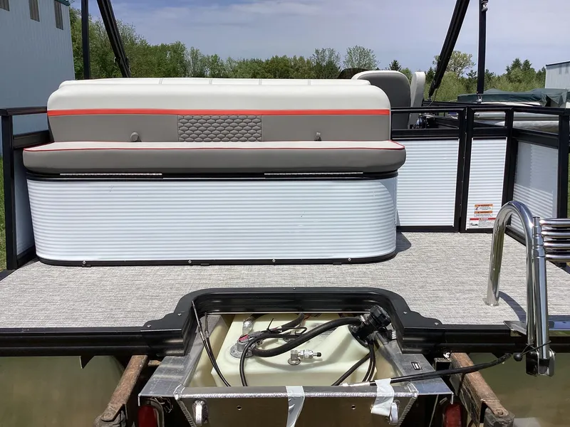 Slide: The Image of 2023 Qwest 820 Lanai L pontoon boat rear seating and engine compartment. - 6