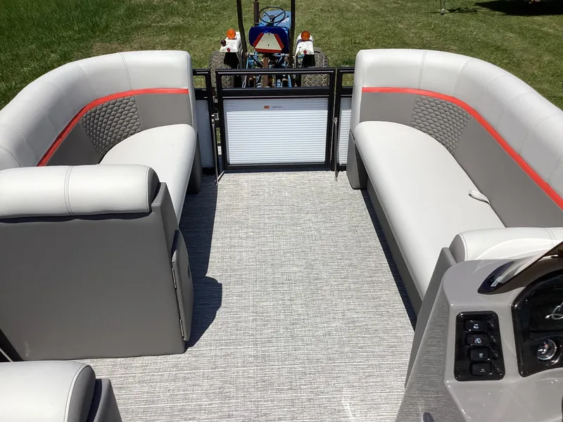 Slide: The Image of 2023 Qwest 820 Lanai L pontoon boat interior with gray and red seating. - 9