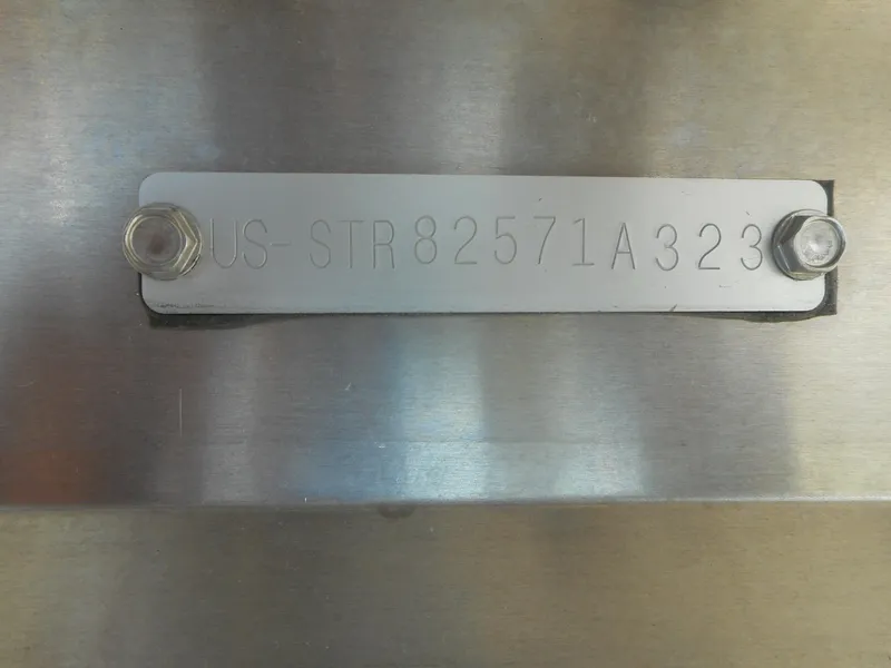 Slide: The Image of 2023 Starcraft CX 23 Q boat identification plate with serial number US STR82571A323. - 13