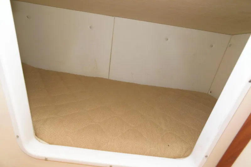 Slide: The Image of Small sleeping berth in 2006 Pursuit 3070 Offshore boat. - 17