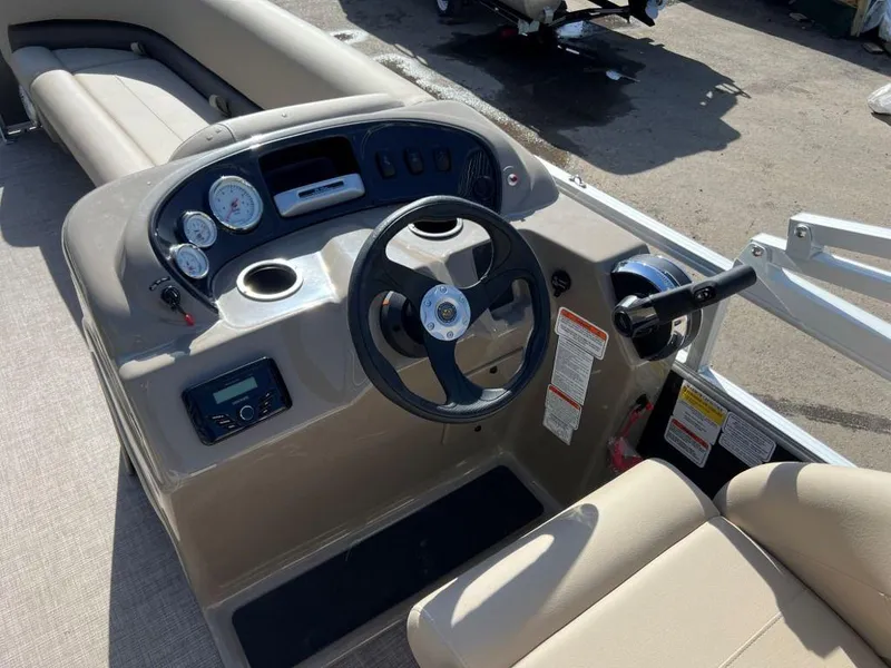 Slide: The Image of 2023 Sun Tracker PARTY BARGE® 18 DLX boat console and steering wheel. - 3