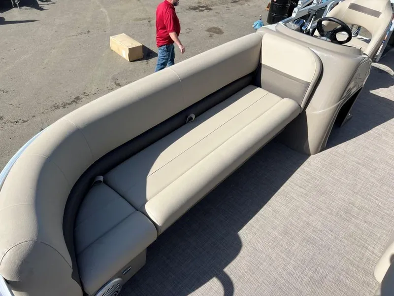 Slide: The Image of 2023 Sun Tracker PARTY BARGE® 18 DLX interior seating and helm station. - 4