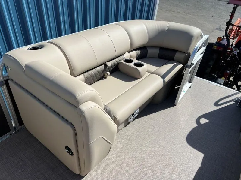 Slide: The Image of 2023 Sun Tracker PARTY BARGE® 20 DLX pontoon boat seating area with beige upholstery. - 4