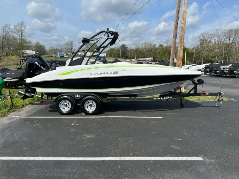 The Image of 2023 Tahoe 2150 boat on trailer in parking lot. - 0