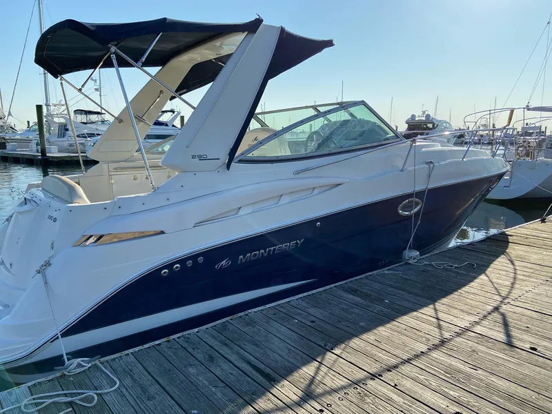 The Image of 2007 Monterey 290 Cruiser docked at a marina on a sunny day. - 0
