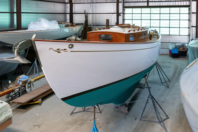 Slide: The Image of Custom 2008 Frank Paine Sloop in storage, showcasing classic design and craftsmanship. - 11