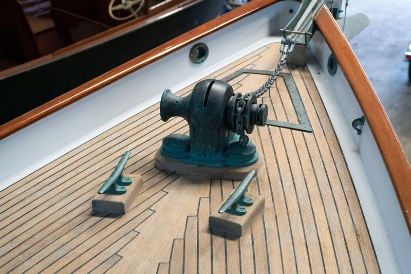 Slide: The Image of Custom Frank Paine Sloop 2008 deck with anchor windlass and cleats. - 15