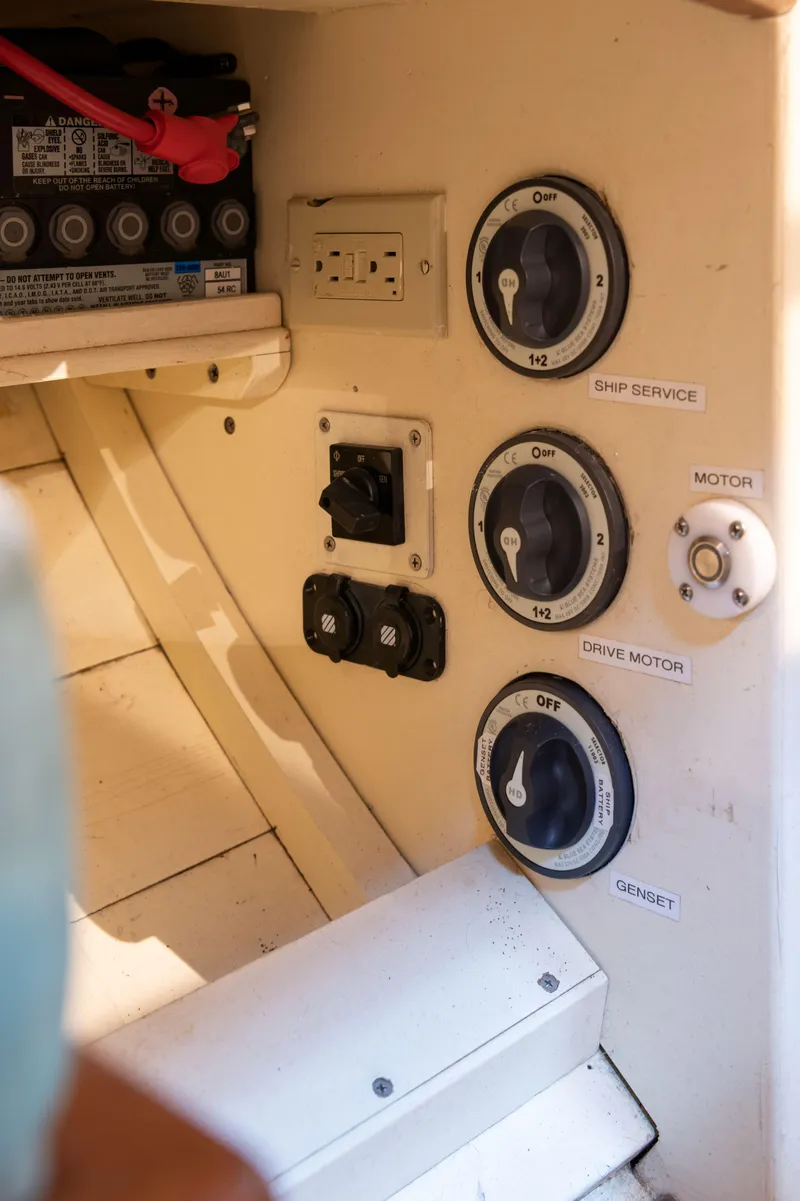 Slide: The Image of Control panel of 2008 Custom Frank Paine Sloop with switches and battery compartment. - 27