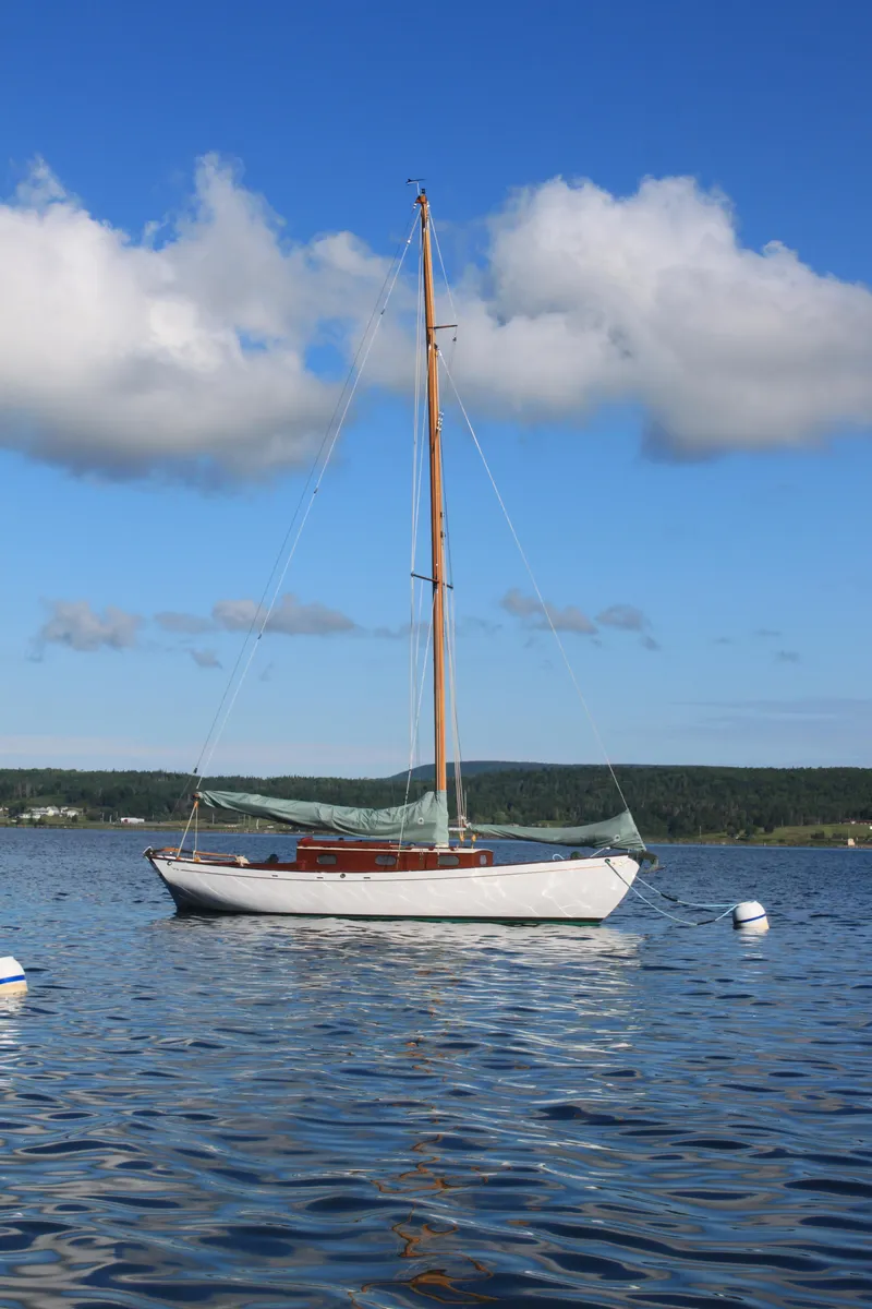 Slide: The Image of Sailboat on calm water, Custom Frank Paine Sloop, 2008, under blue sky with clouds. - 4