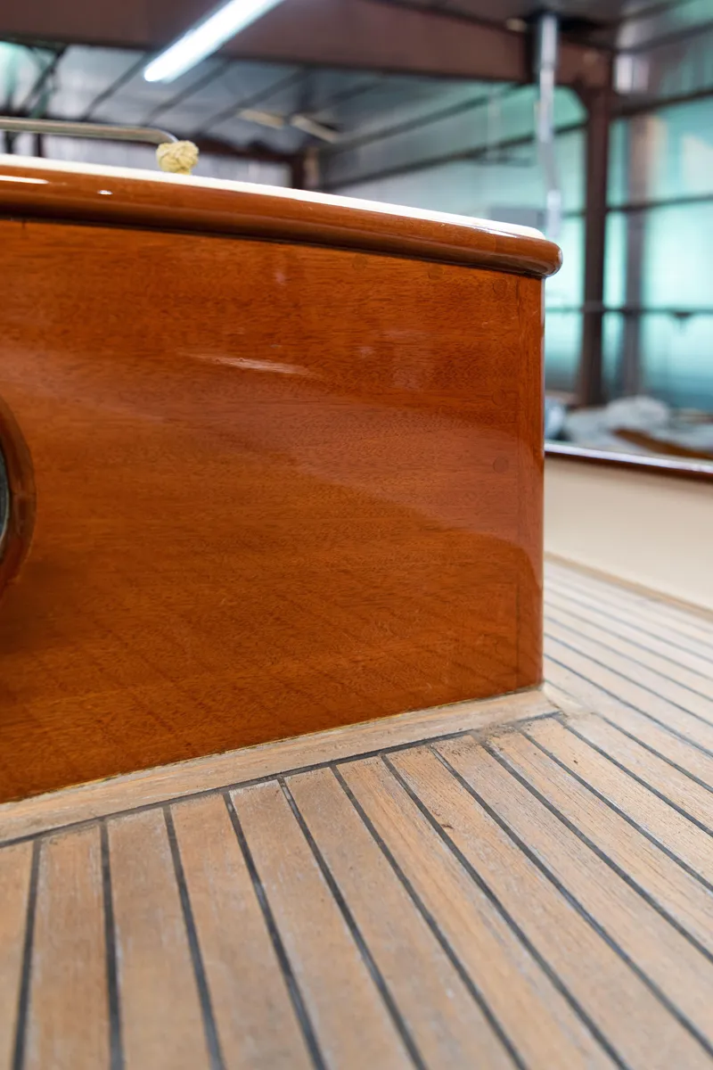Slide: The Image of Custom 2008 Frank Paine Sloop with polished wood finish and sleek deck design. - 46