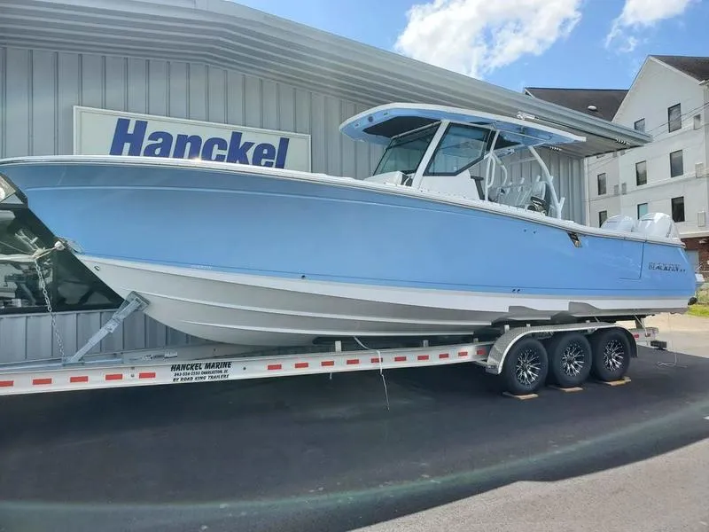 The Image of 2023 Blackfin 332cc boat on a trailer at Hanckel Marine dealership. - 1