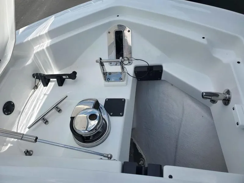 Slide: The Image of 2023 Blackfin 332cc boat anchor locker with stainless steel hardware. - 6