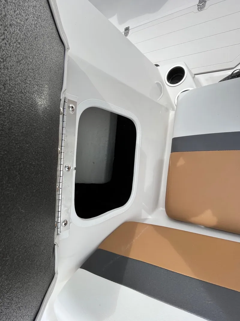 Slide: The Image of 2024 Starcraft SVX 171 boat interior storage compartment and seating. - 12