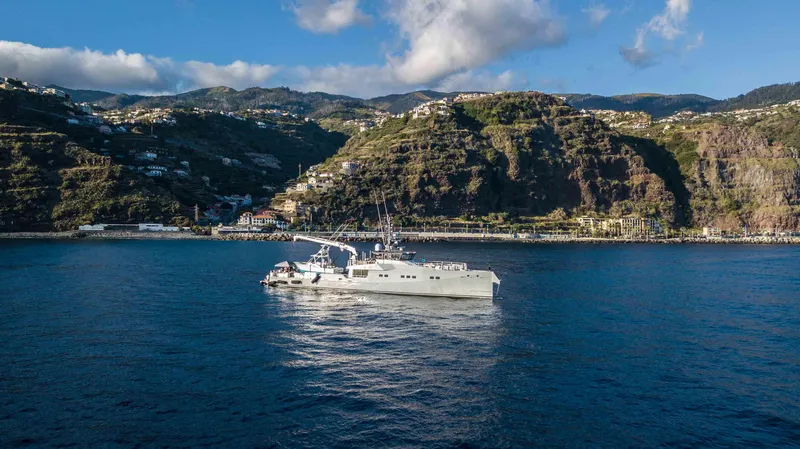 Slide: The Image of Damen YS 4508 yacht cruising near scenic coastline, 2019. - 2