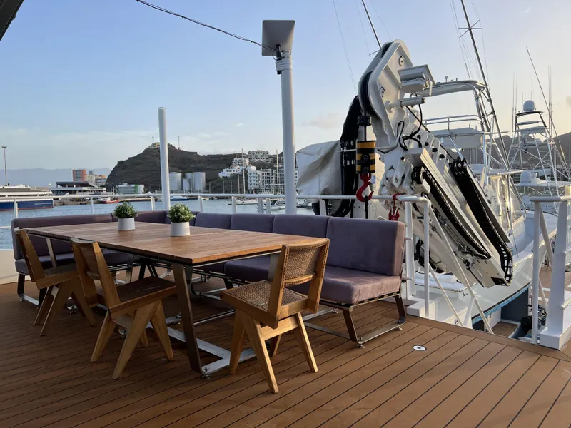 Slide: The Image of Deck of a 2019 Damen YS 4508 with wooden furniture. - 23
