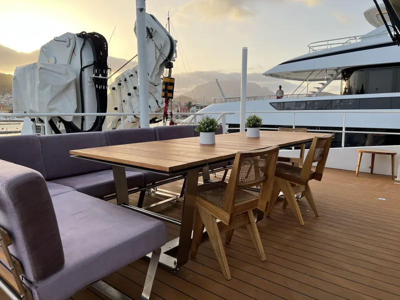 Slide: The Image of Deck of a 2019 Damen YS 4508 with table and chairs. - 24