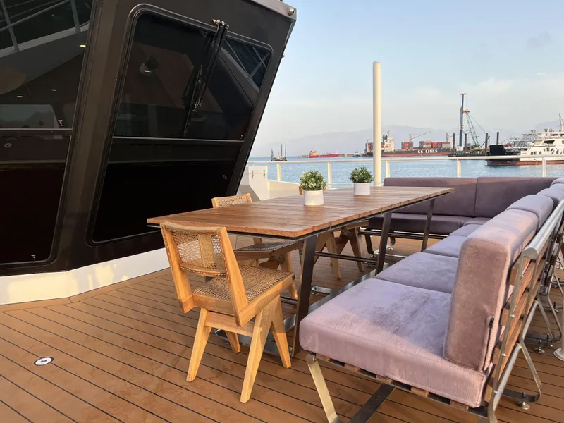 Slide: The Image of Deck area of Damen YS 4508 yacht with table and chairs, 2019. - 25