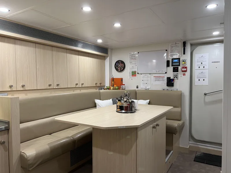 Slide: The Image of Interior of Damen YS 4508 yacht, 2019, featuring dining area. - 31