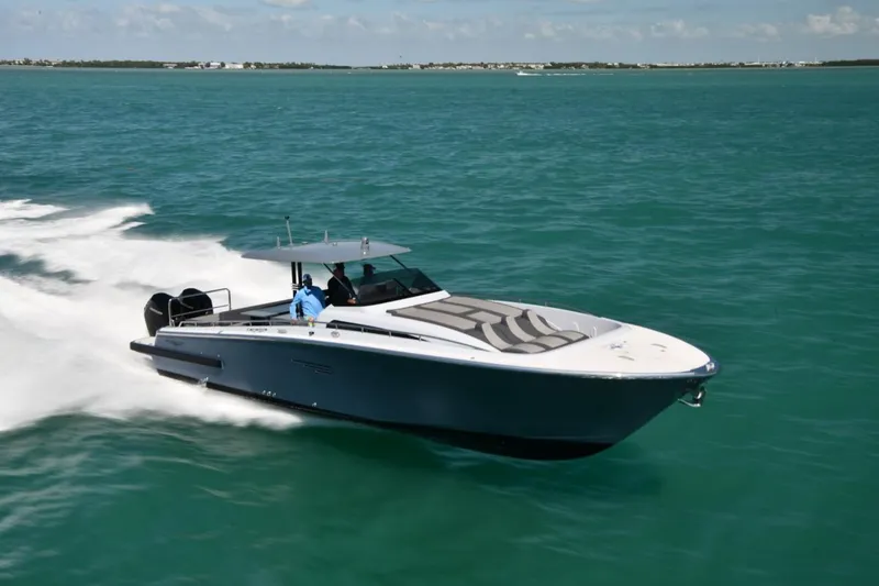 Slide: The Image of 2023 Canados 431 Gladiator speedboat cruising on open water. - 10