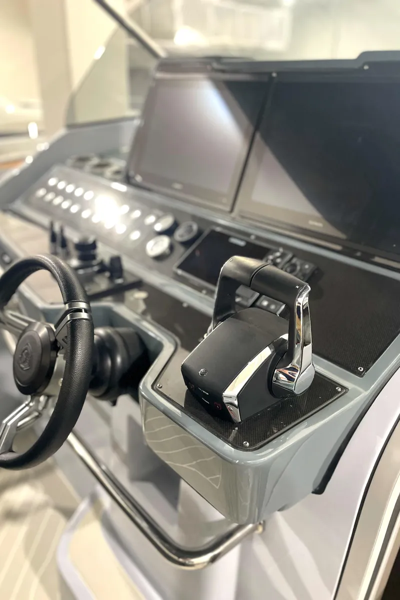 Slide: The Image of 2023 Canados 431 GLADIATOR helm with advanced controls and dual displays. - 14