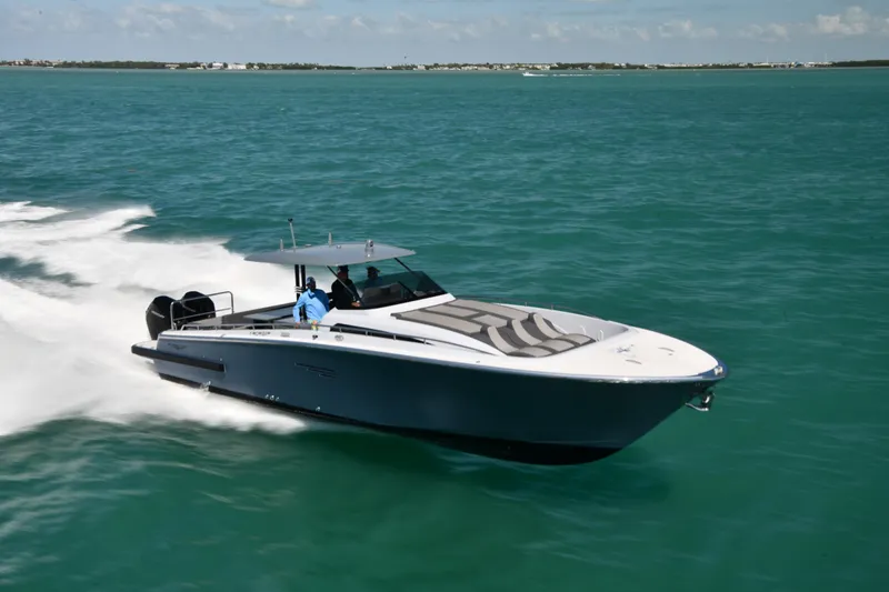 Slide: The Image of 2023 Canados 431 GLADIATOR speedboat cruising on open water. - 2