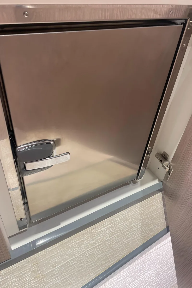 Slide: The Image of Stainless steel refrigerator door on 2023 Canados 431 Gladiator yacht. - 26