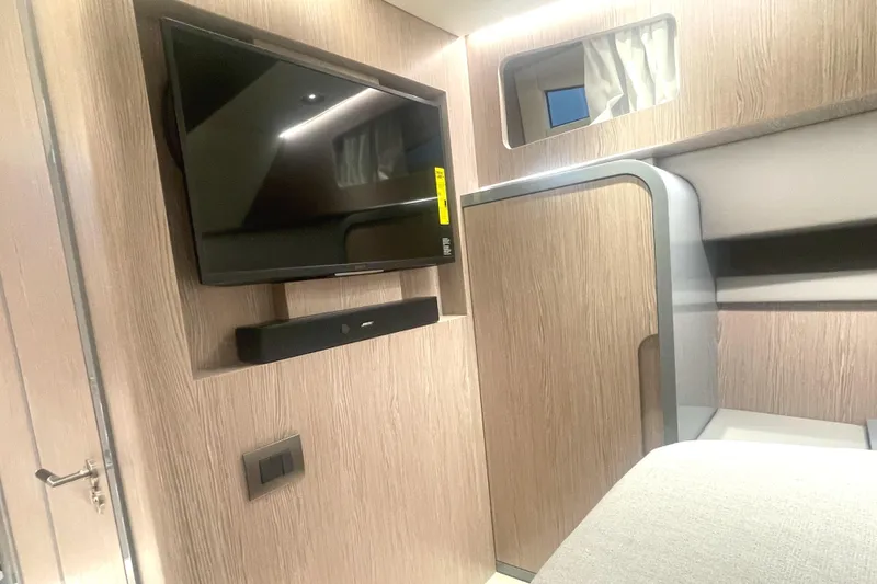 Slide: The Image of Modern interior of 2023 Canados 431 GLADIATOR yacht with TV and soundbar. - 31