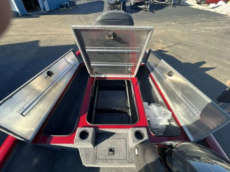 Slide: The Image of 2023 Tracker Pro Team™ 190 TX boat storage compartments open. - 4