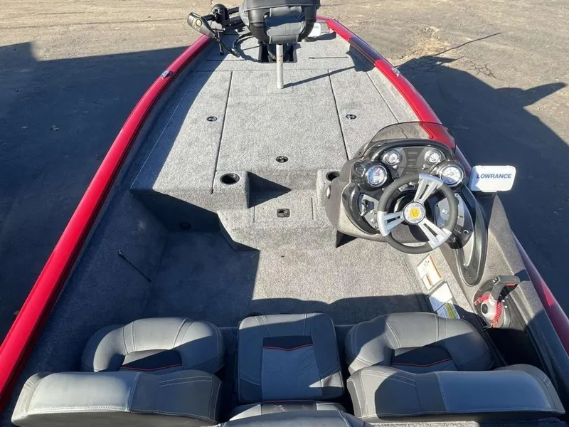 Slide: The Image of 2023 Tracker Pro Team™ 190 TX boat interior with steering console and seating. - 6