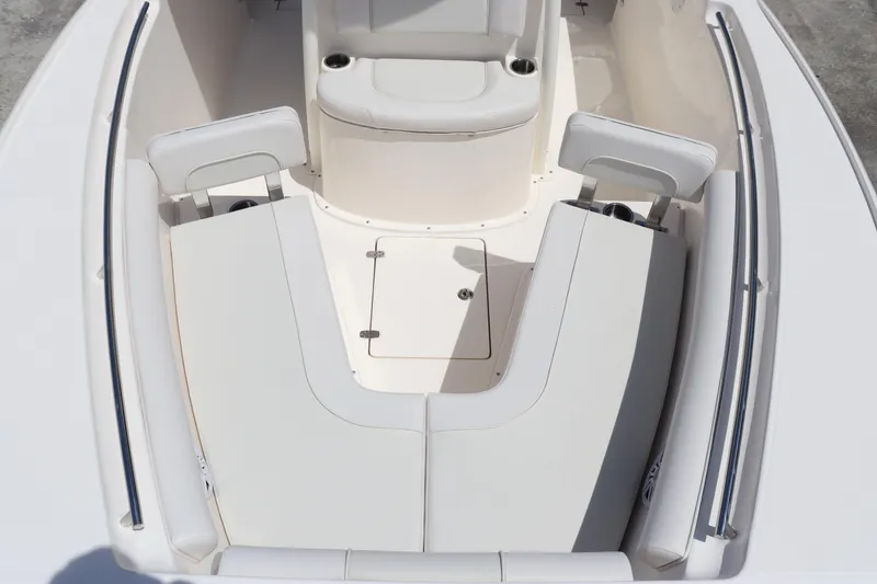 Slide: The Image of 2023 Sea Born SX239 Offshore boat interior seating and storage area. - 11