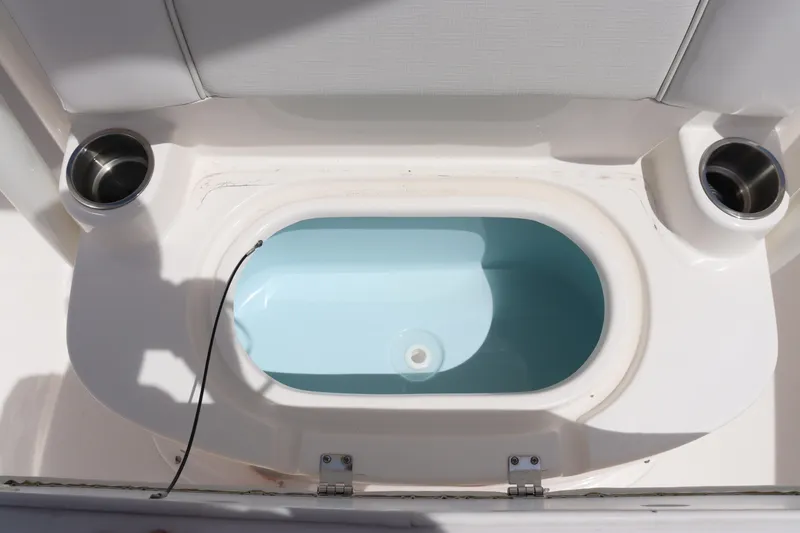 Slide: The Image of 2023 Sea Born SX239 Offshore boat livewell with dual cup holders. - 28