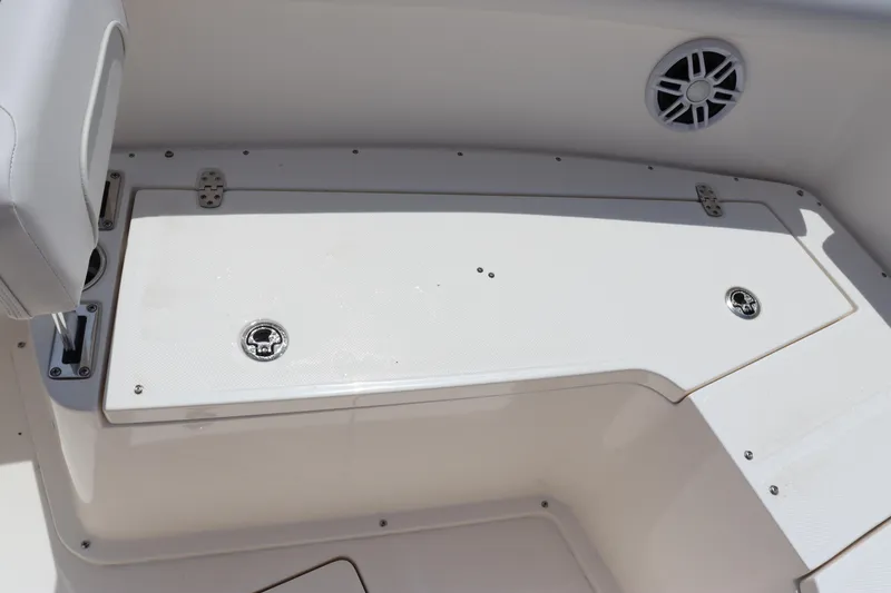 Slide: The Image of 2023 Sea Born SX239 Offshore boat deck with storage compartments and speaker. - 31